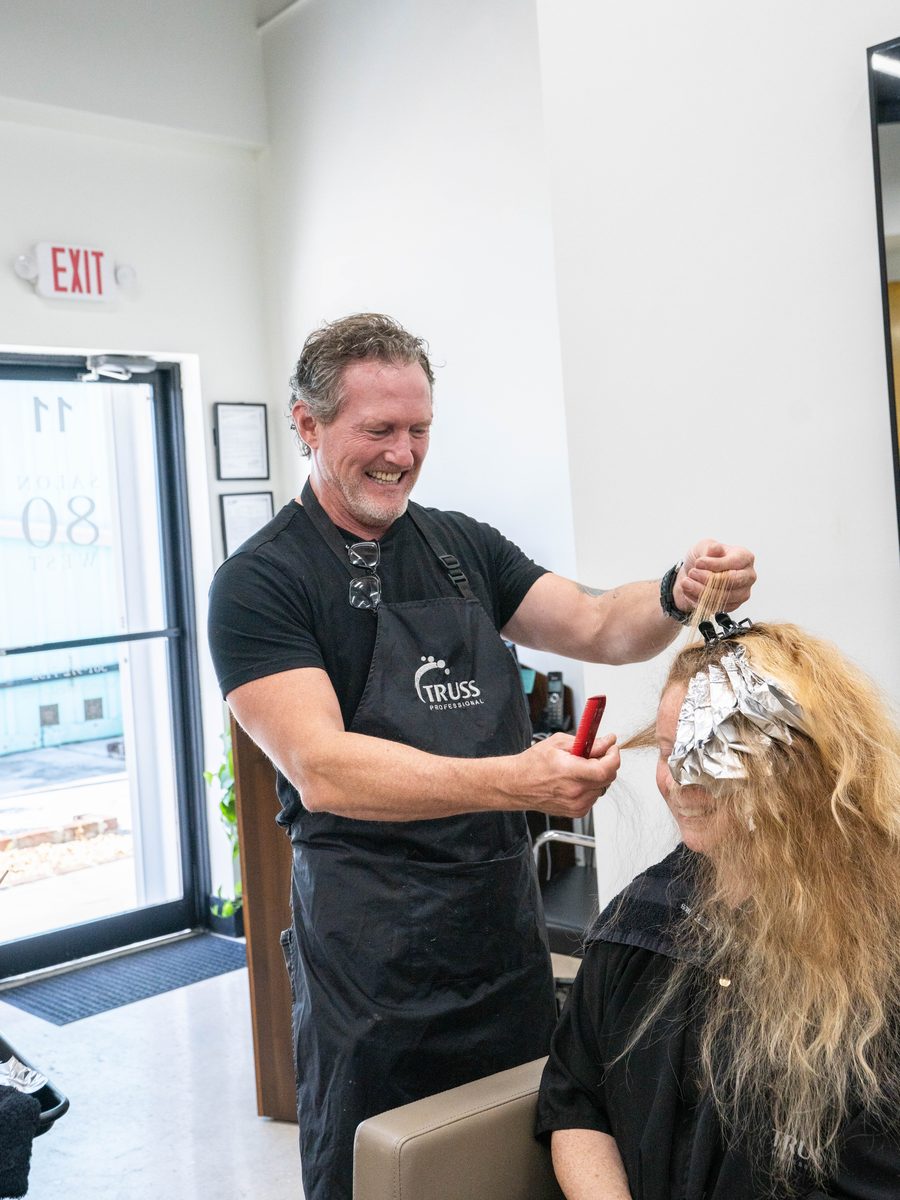 Owner Sean Kennedy foiling highlights at his station