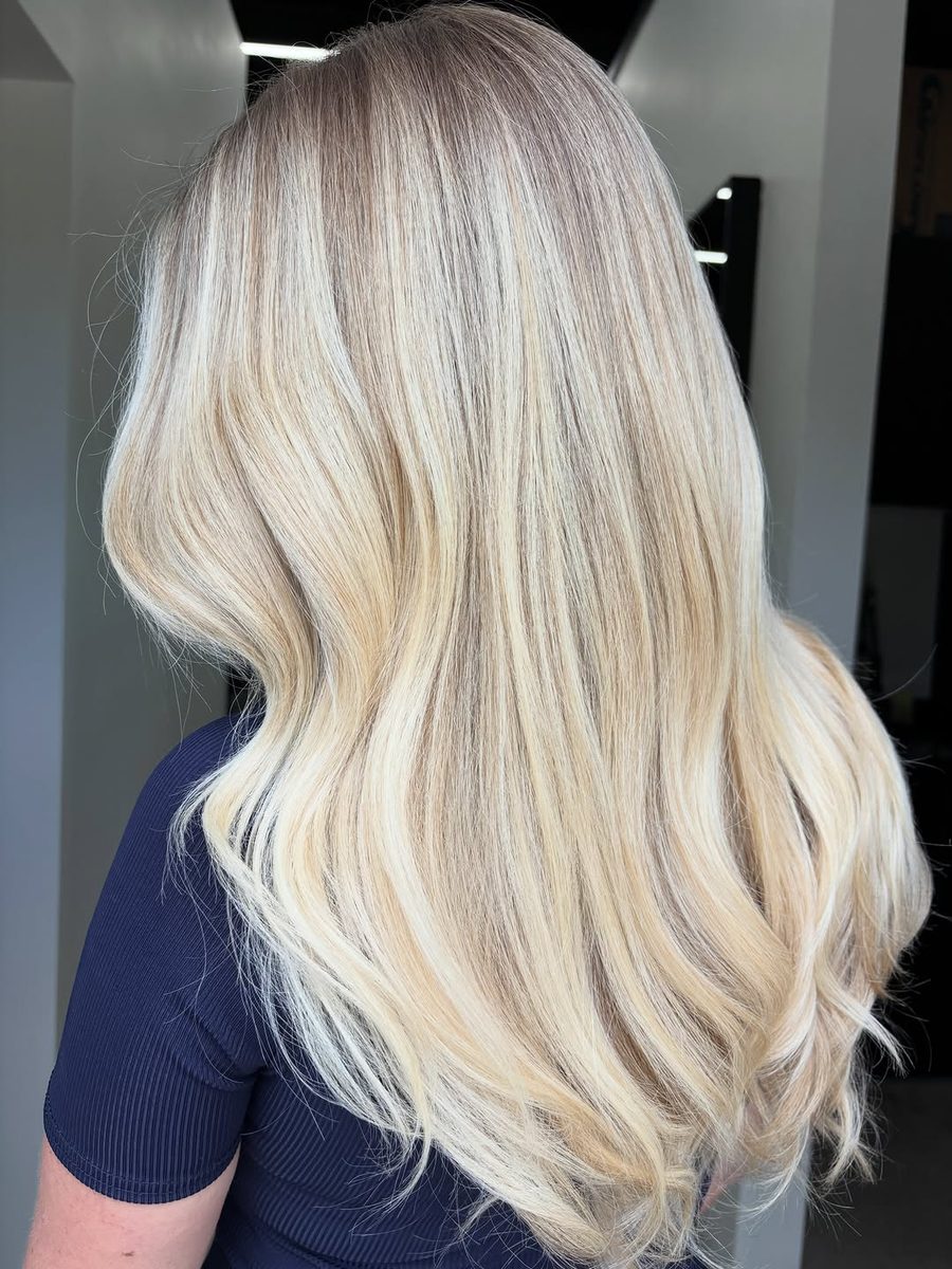 Creamy blonde color, soft waves